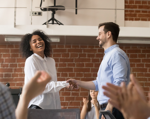 Man and woman give handshake